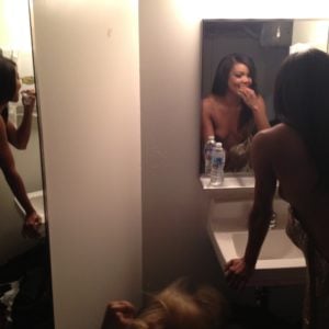 hacked pic of gabrielle union with her ass sticking out and tits revealed in her bathroom while brushing her teeth