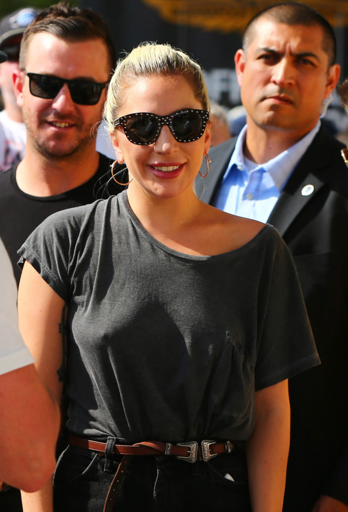 Celebrity Lady Gaga in dark shirt braless