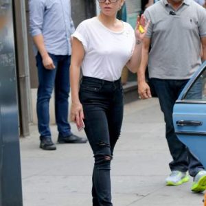 Lady Gaga wearing a white t-shirt and no bra