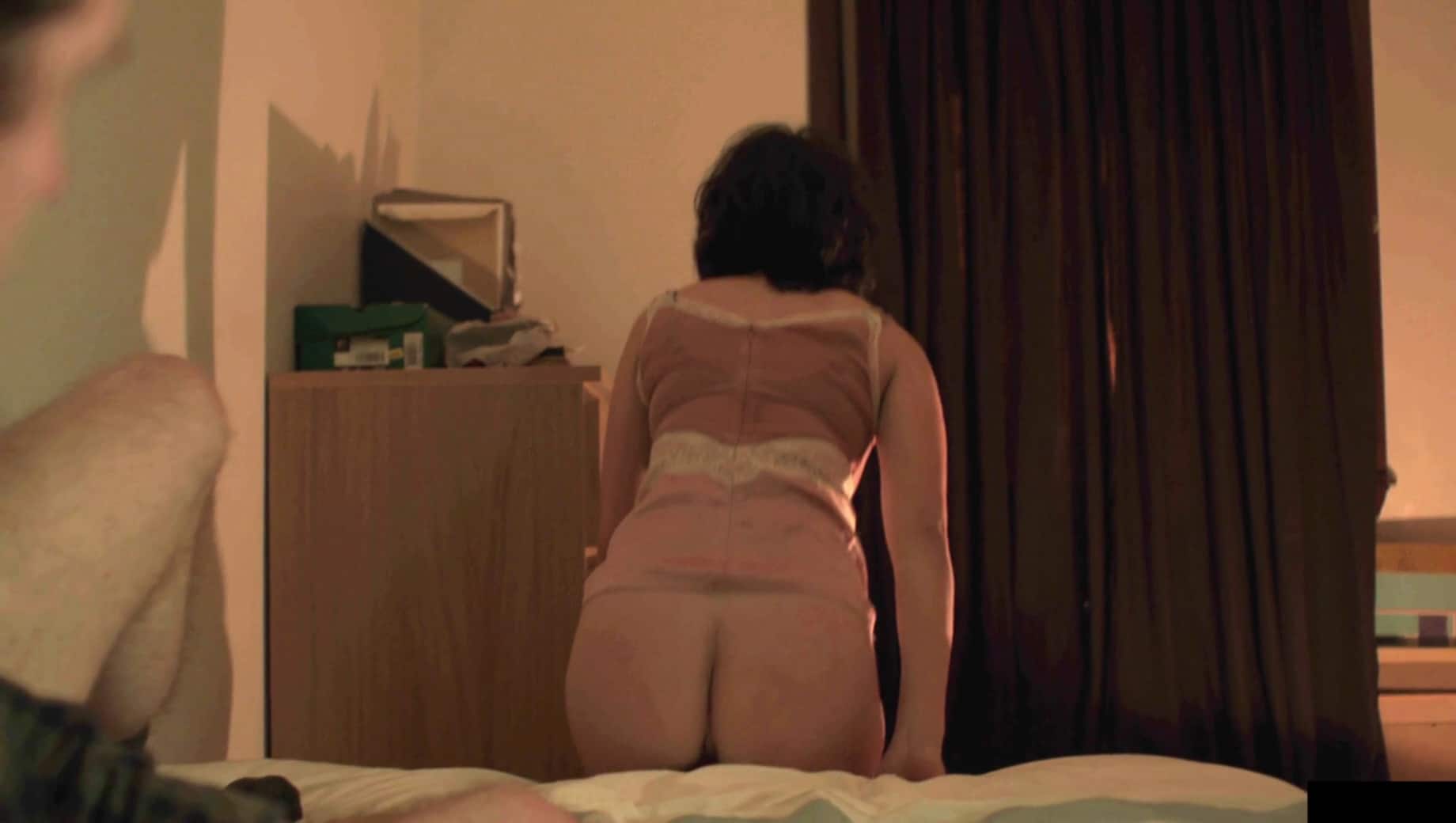The ravishing Scarlett Johansson showing her ass off in a dark room