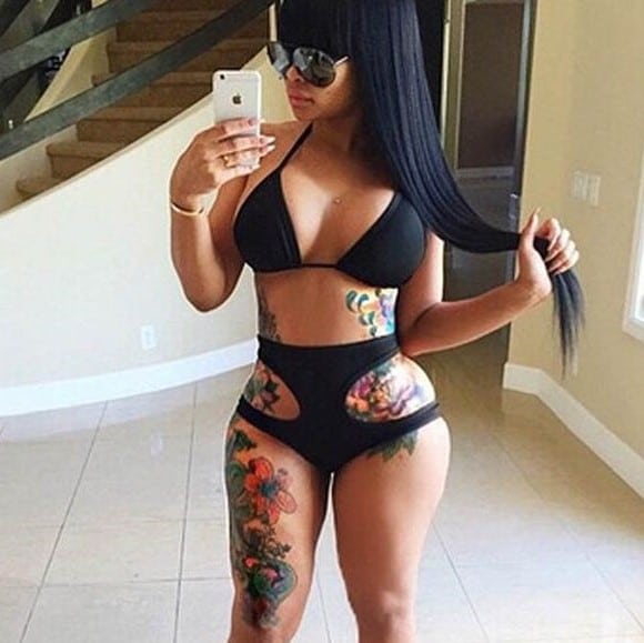 Blac Chyna taking a selfie in a skimpy black outfit