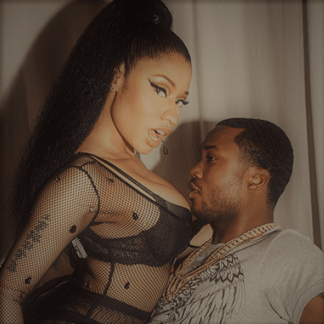 Nicki Minaj sticking her boobs in Meek Mill's face