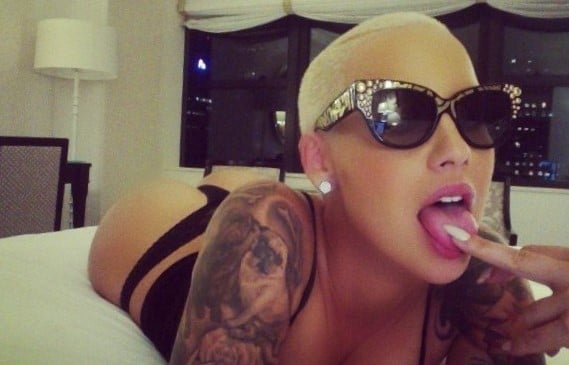 Sexy photo of Amber Rose in lingerie with legs open