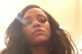 Rihanna taking a selfie with long hair