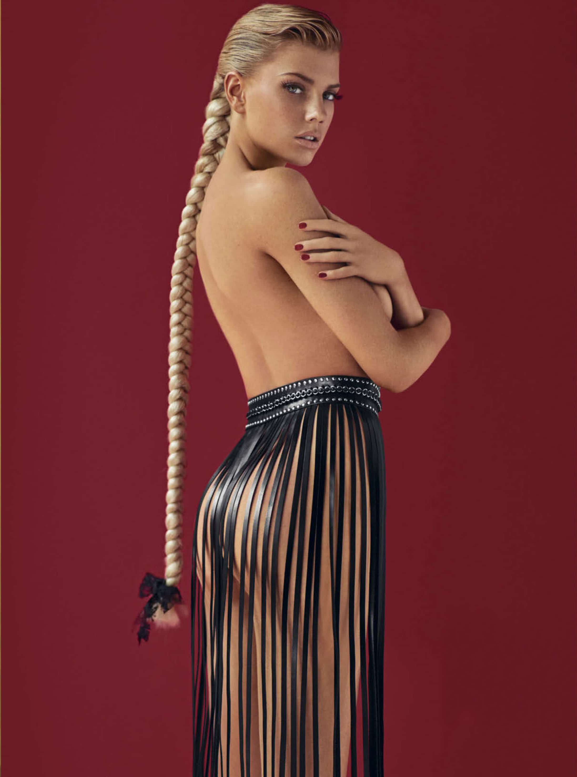 model charlotte mckinney poses topless with long braid for gq mexico