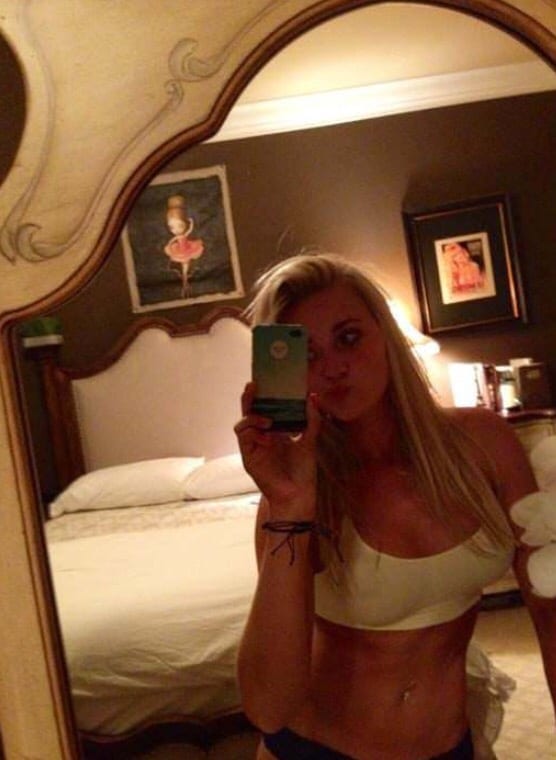 AJ Michalka taking a mirror selfie in underwear with her hair down