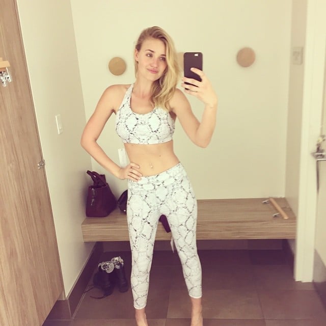AJ Michalka taking selfie in yoga outfit