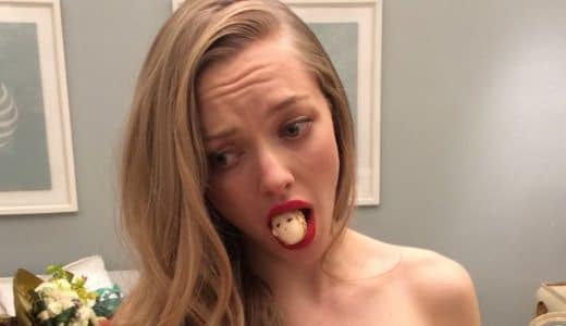 Amanda Seyfried with doll head in her mouth