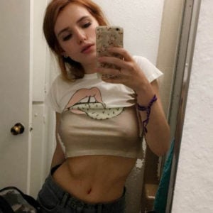 Bella Thorne mirror selfie in a white crop top