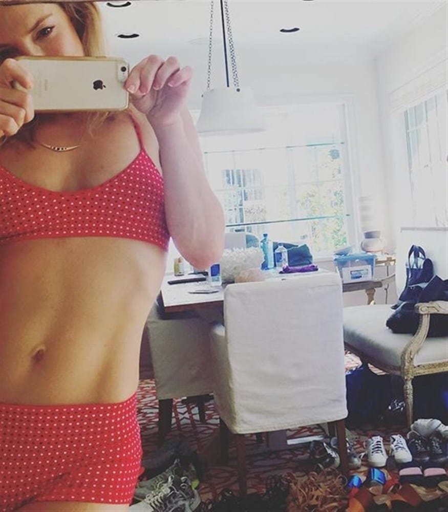 Kate Hudson in red underwear taking a selfie