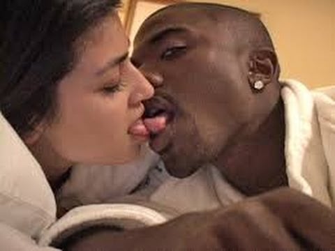 Kim Kardashian and Ray J touching tongues