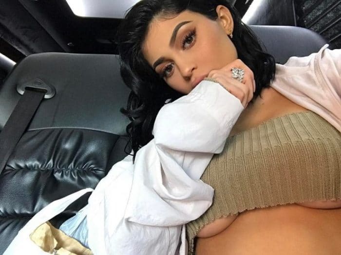 Kylie Jenner showing some bare under boob in car selfie