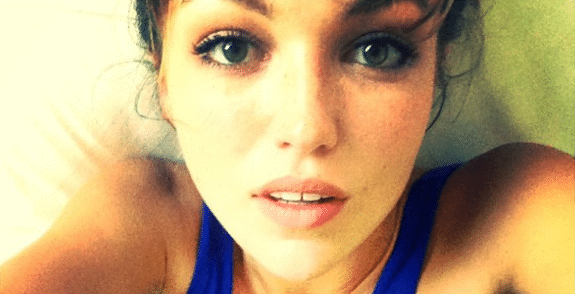 Lili Simmons selfie in bed wearing blue tank top
