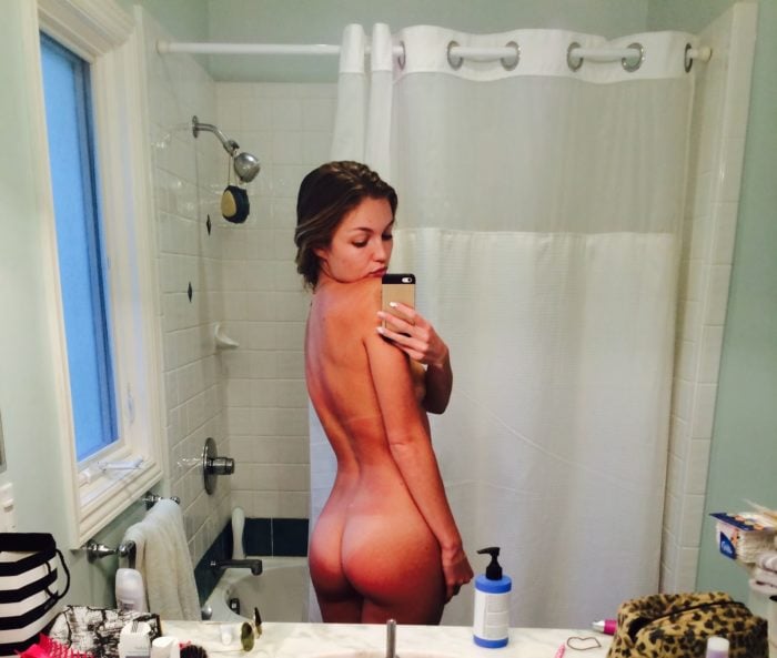 Lili Simmons taking a selfie in the bathroom completely nude showing her ass