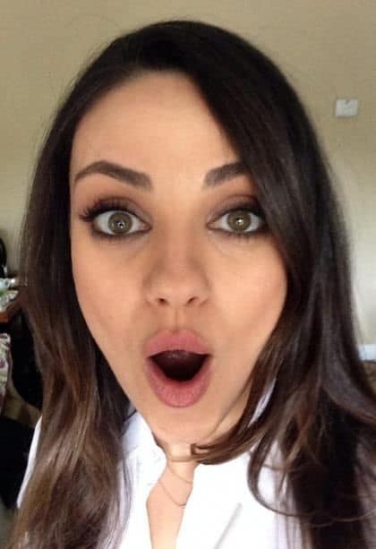 Mila Kunis with her mouth open