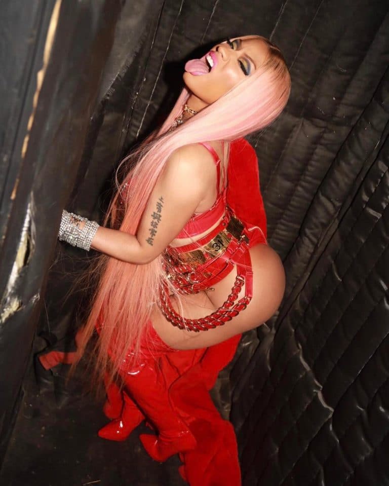 Nicki Minaj bares her ass in red outfit