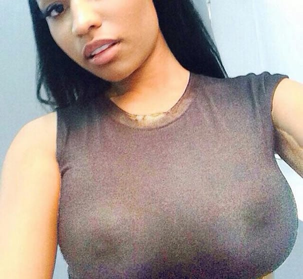Nicki Minaj see through nipples in tight shirt taking a selfie