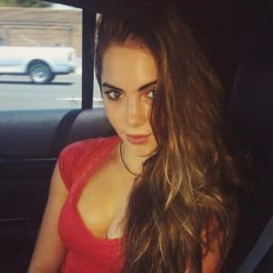 Sexy pic of McKayla Maroney in red shirt showing off her busty breasts