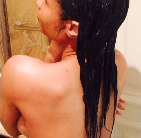 Topless Nicki MInaj in shower showing her backside