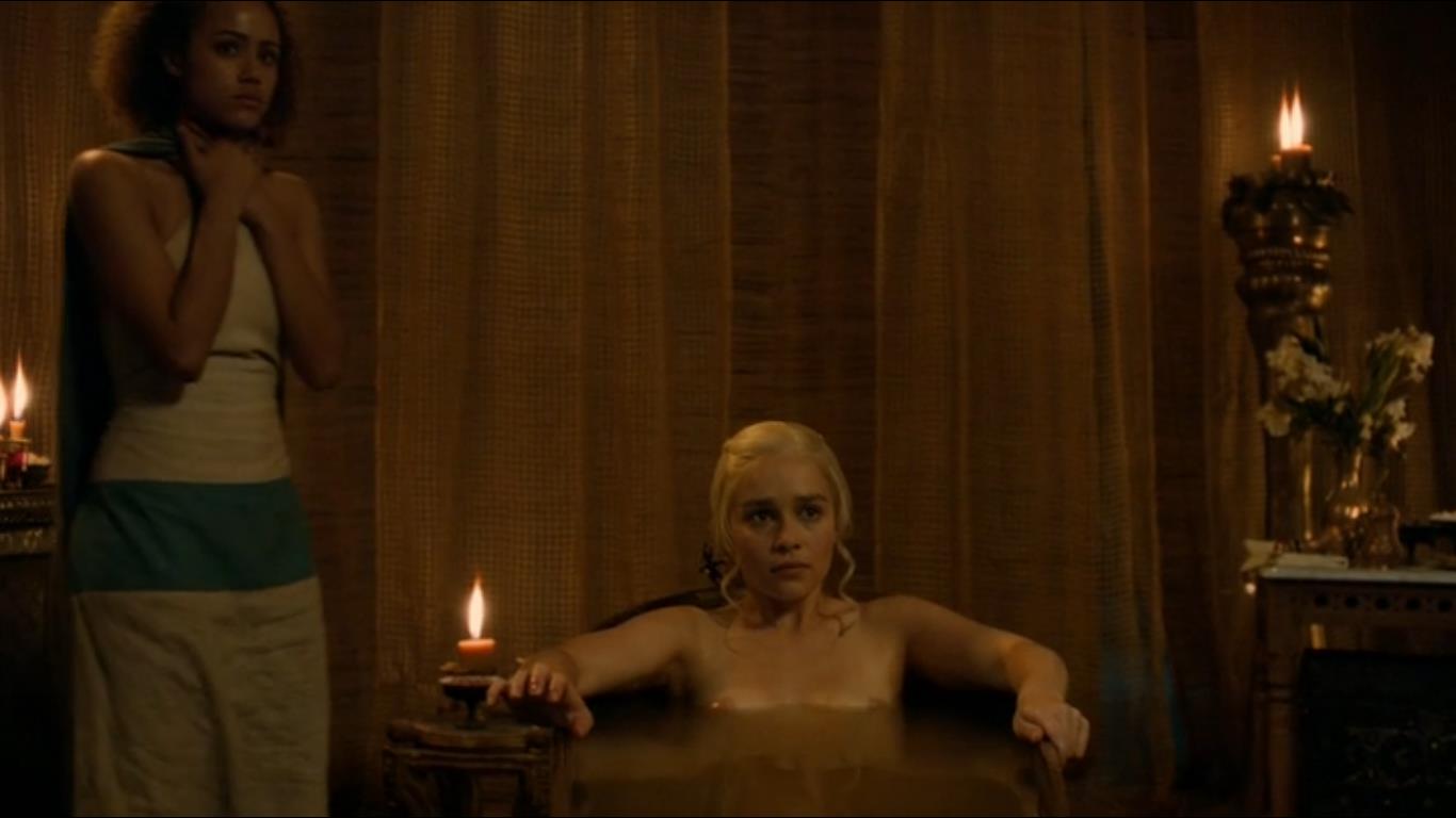 Emilia Clarke in a bathtub boobs above water