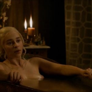 Emilia Clarke soaking in a bathtub nipples exposed