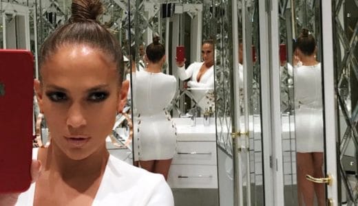 Jennifer Lopez taking a selfie in a room of mirrors