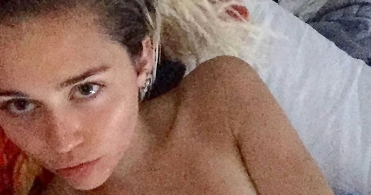 Miley Cyrus topless selfie in bed