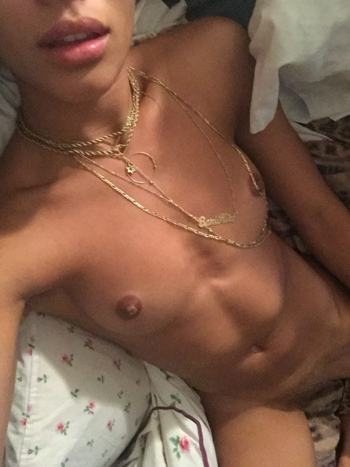 Sami Miro completely naked wearing gold necklaces