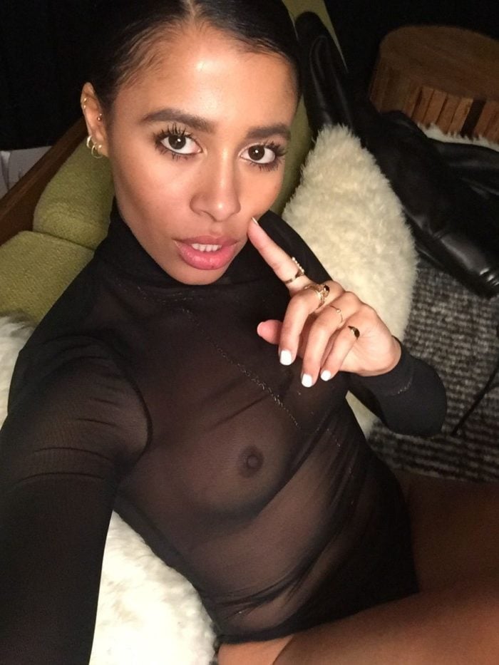 Sami Miro in a sheer black bodysuit nipples exposed