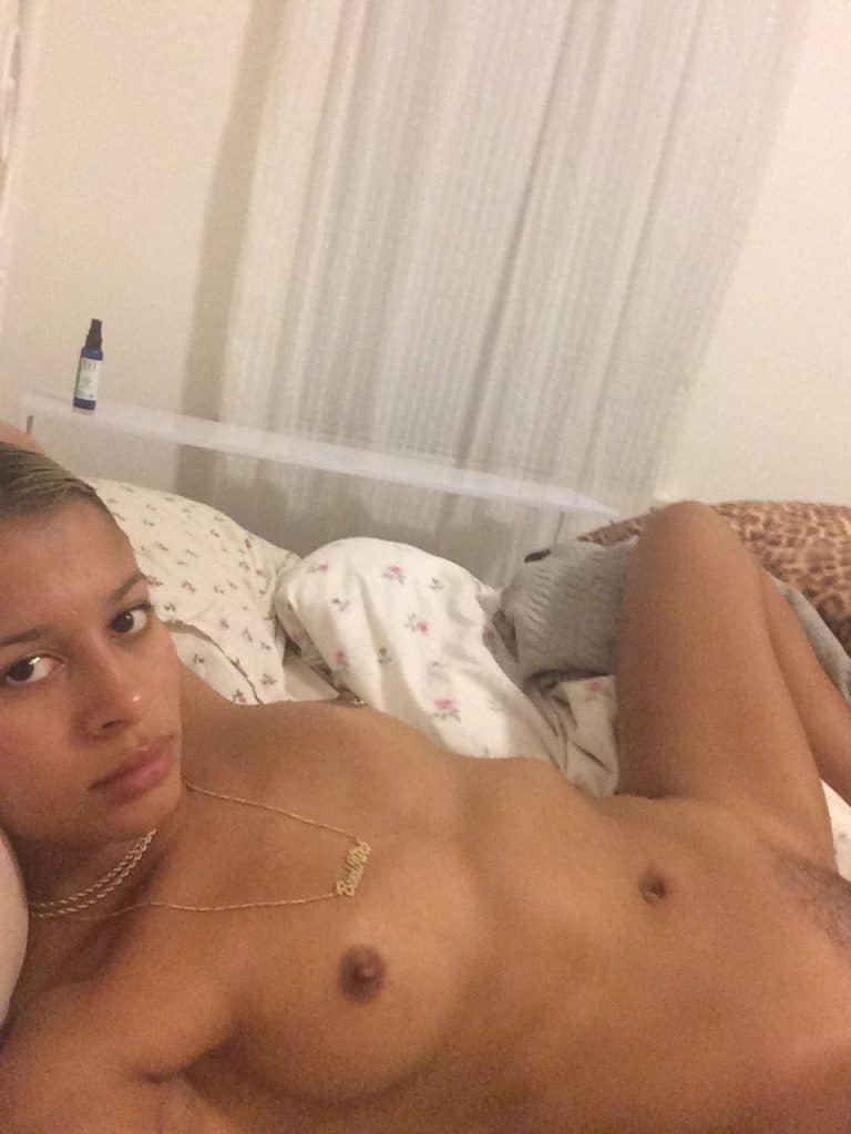 Sami Miro laying in bed completely nude with legs spread open