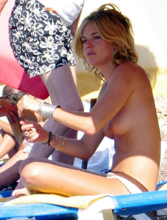Sienna Mller without a top at the beach