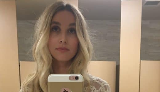 Whitney Port taking a bathroom selfie in airport