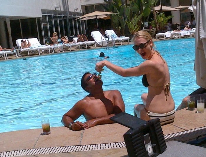 Yvonne Strahovski at the pool feeding a friend grapes