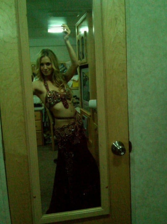 Yvonne Strahovski taking a selfie in a belly dancer costume