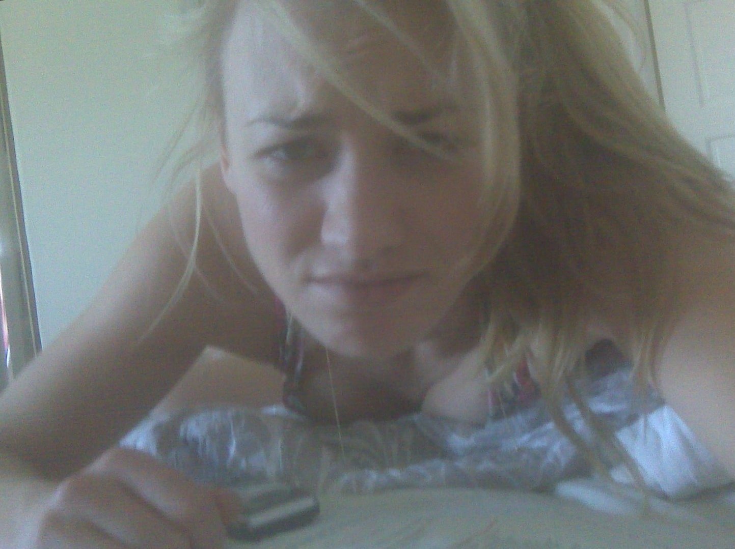 Yvonne Strahovski taking a selfit in bed cleavage showing