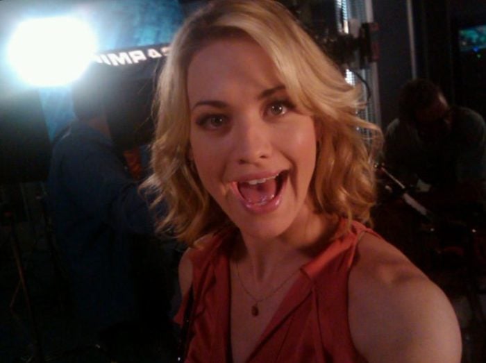 Yvonne Strahovski talking a selfie with mouth open