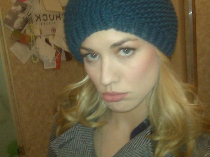 Yvonne Strahovski wearing a beanie making a pouty face