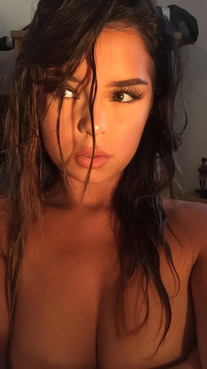 Demi Rose unclothed with wet hair in selfie pic