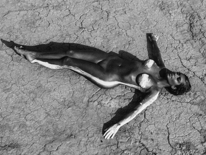 Kim Kardashian completely nude laying down in the desert