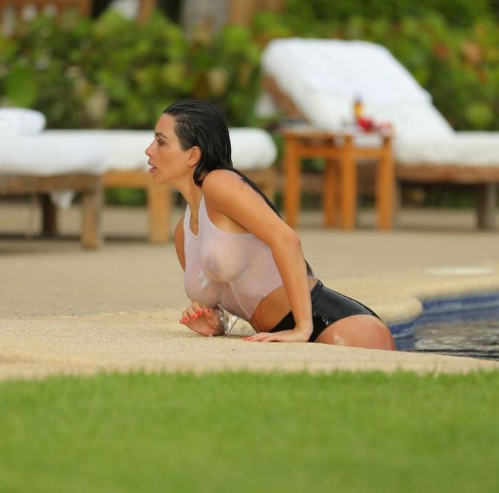 Kim Kardashian getting out of the pool
