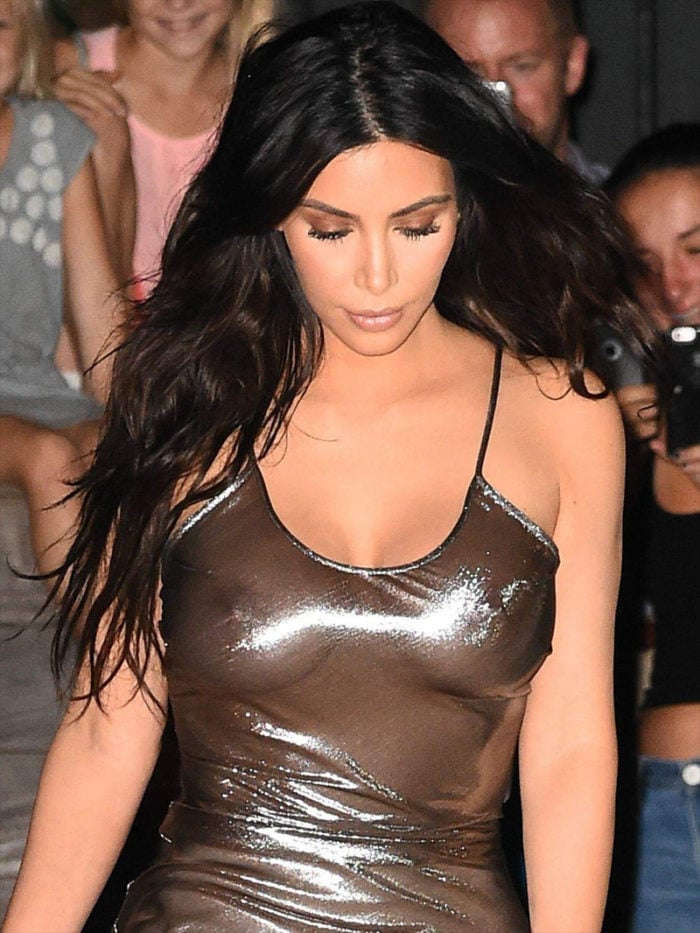 Kim's tits showing in shiny dress