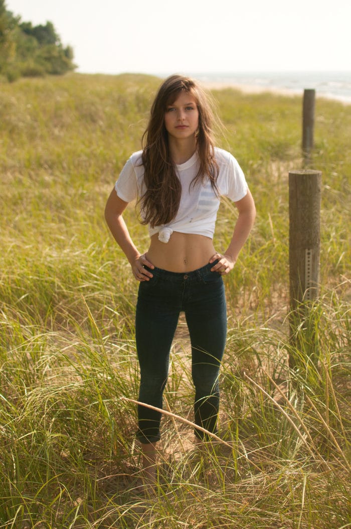 wearing tight pants in a field