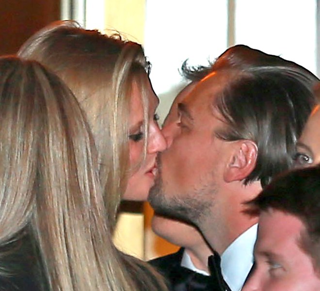 Toni Garrn and Leo kissing