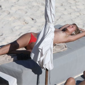Toni Garrn in Tulum sunbathing without her top on (4)